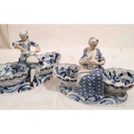 Pair of rare blue onion Meissen Sweetmeat dishes with boy eating soup and lady with a chicken