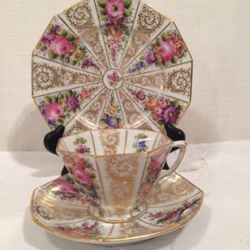 Set of twelve Wiswall Dresden octagonal cups and saucers and cake plates