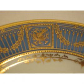 Close up of the edge of one of twelve Dresden Gilded Plates, with raised gilding and jeweling.