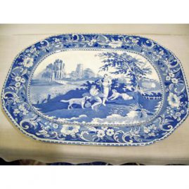 Rare Davenport well and tree platter with picture of lady, man baby and dog in a country setting.