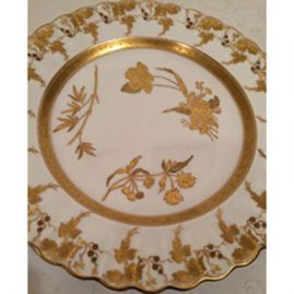 Set of twelve gilded and fluted Copeland dinner plates each painted with different wild flowers.