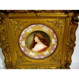 Royal Vienna framed plate signed Wagner of Astana with intricate raised gilding and blue jeweling,