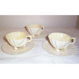 3 Belleek shell foot cups and saucers