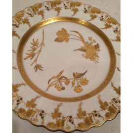 Set of twelve gilded and fluted Copeland dinner plates each painted with different wild flowers