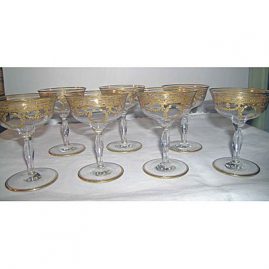 7 gilded champagnes or sherbets with wreaths and bows