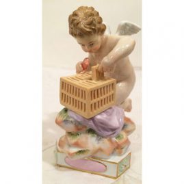Meissen cherub figure of cherub putting heart in cage, titled je le captive
