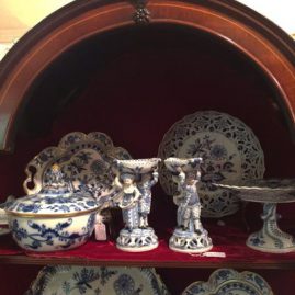 Meissen blue onion dinnerware display