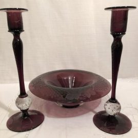 Pairpoint amethyst wheel cut console set with pair of candlesticks and bowl.