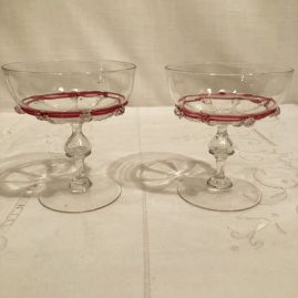 Set of five Salviati Venetian champagnes or coupes with raised pink ribbon glass decoration and applied crystal balls.