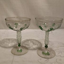 Pair of rare Venetian hollow stem champagnes with raised grape and vine decoration