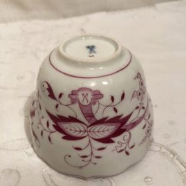 Close up of pink onion tea cup
