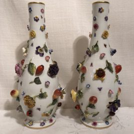 Pair of Meissen vases with raised flowers and fruit