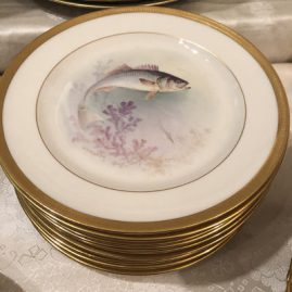 Set of twelve W. H. Morley fish plates, each painted differently.