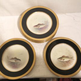 Set of eleven fish plates artist signed w.h. Morley, each painted with different fish.