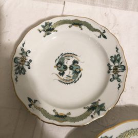 One of fourteen Meissen green court dragon dessert plates