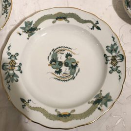 One of fourteen Meissen green court dragon dinner plates
