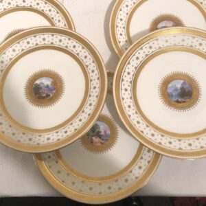 Set of eight English Minton luncheon or dessert plates with miniature paintings