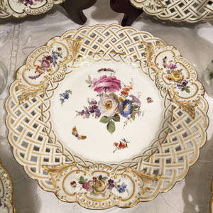 Set of Ten Meissen Reticulated Dessert Plates Painted With Flowers and Insects from Germany