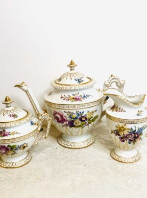 Helena Wolfson Dresden tea set with hand -painted flowers and raised faces of ladies