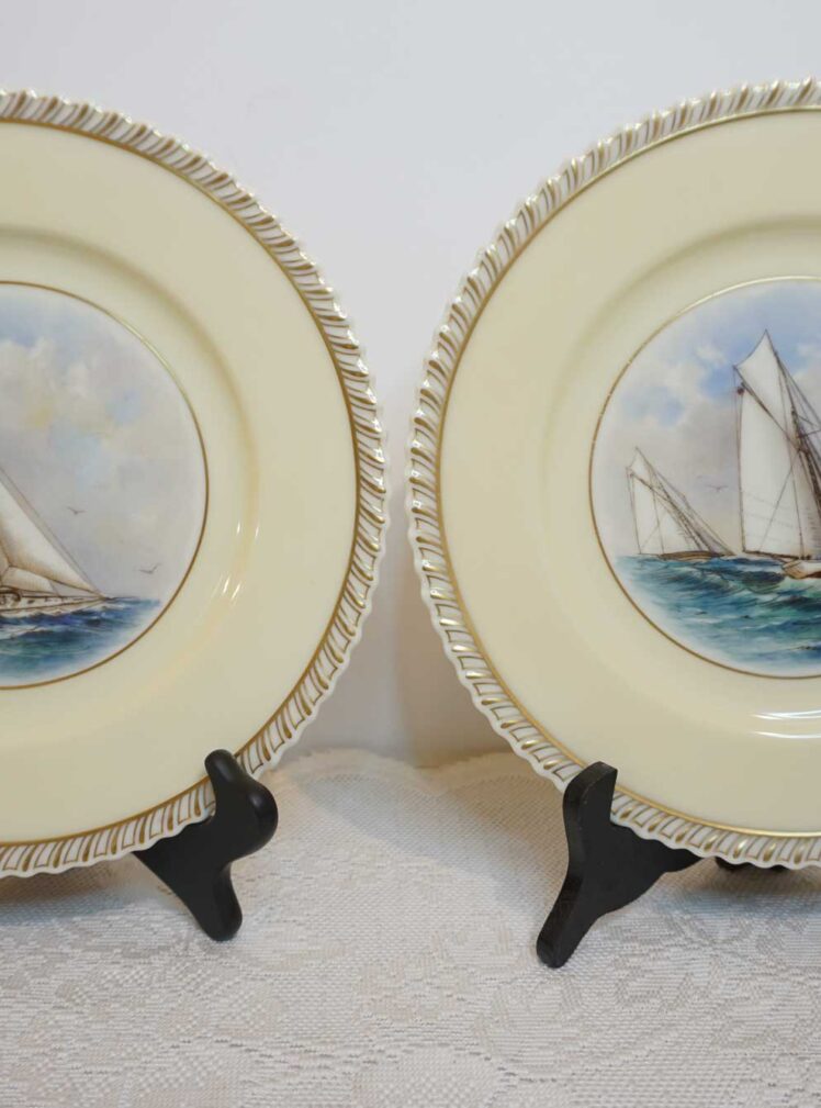 Set of 12 Lenox dinner plates each painted with a different sailing ship from the Americas Cup