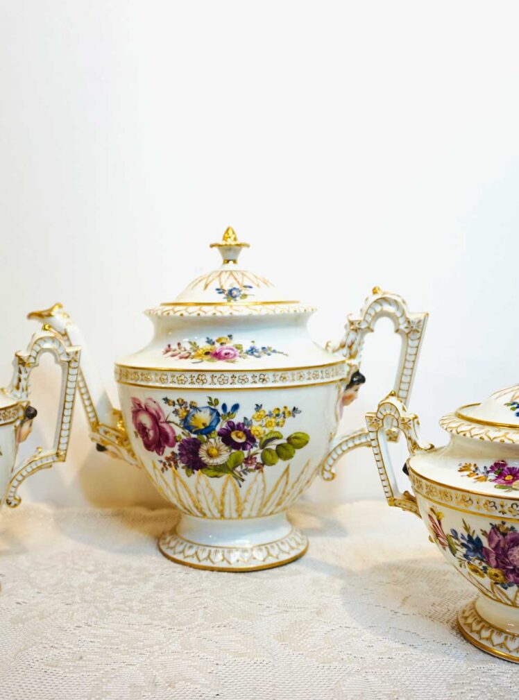 Helena Wolfson Dresden tea set with hand -painted flowers and raised faces of ladies