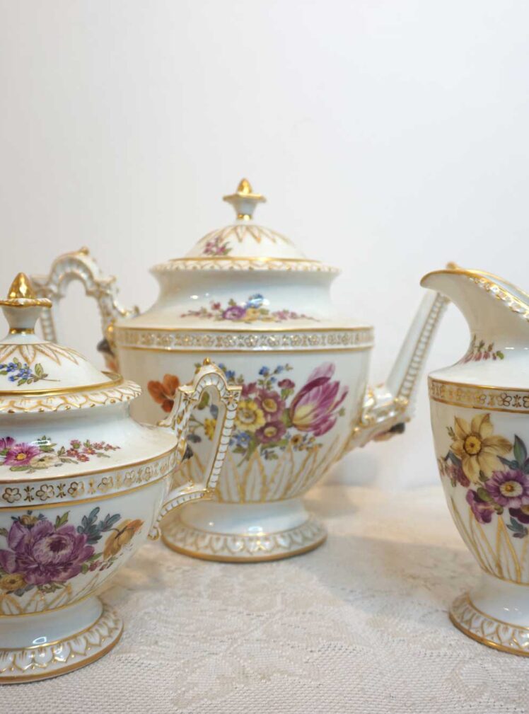 Helena Wolfson Dresden tea set with hand -painted flowers and raised faces of ladies