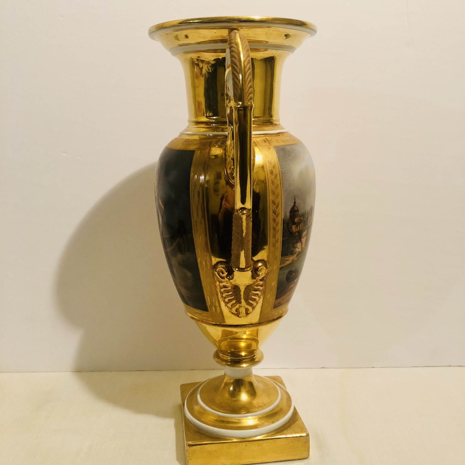 Paris Porcelain Vase with Paintings on Both of its Sides and Masked Handles Paris Porcelain Vase with Paintings on Both of its Sides and Masked Handles