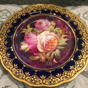 Set of 12 Cauldon cobalt plates with exceptionally painted bouquets