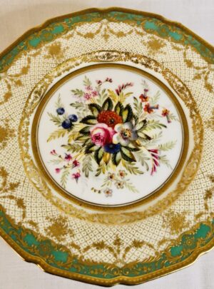 Twelve Royal Doulton museum quality plates artist signed E. Wood