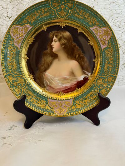 abinet portrait plate that has a central painting of a beautiful lady with long flowing hair abinet portrait plate that has a central painting of a beautiful lady with long flowing hair