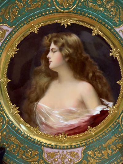 abinet portrait plate that has a central painting of a beautiful lady with long flowing hair abinet portrait plate that has a central painting of a beautiful lady with long flowing hair