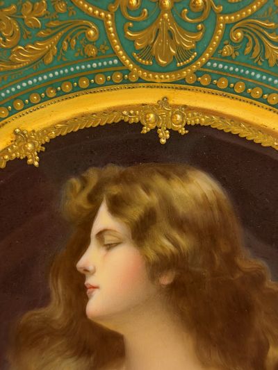 abinet portrait plate that has a central painting of a beautiful lady with long flowing hair abinet portrait plate that has a central painting of a beautiful lady with long flowing hair