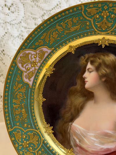 abinet portrait plate that has a central painting of a beautiful lady with long flowing hair abinet portrait plate that has a central painting of a beautiful lady with long flowing hair