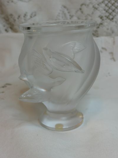 Iridescent Lalique vase that has two raised birds that look like they are in flight
