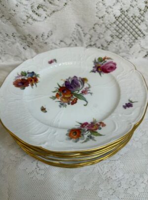 Set of 8 KPM plates each painted with a different flower bouquet