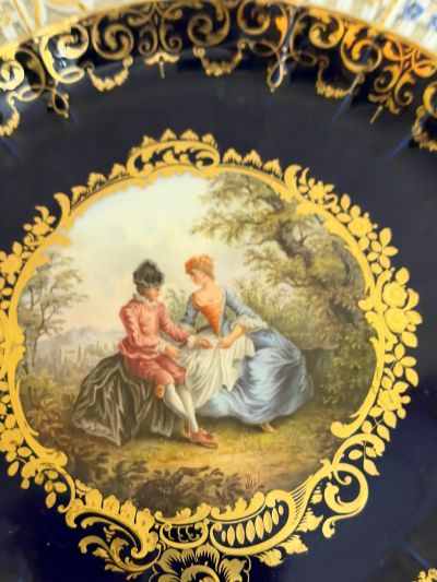 Meissen Cobalt Plate with a Reticulated Border with Raised Forget-Me-Nots and a Painting of a Scene of Lovers Meissen Cobalt Plate with a Reticulated Border with Raised Forget-Me-Nots and a Painting of a Scene of Lovers