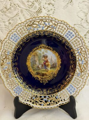 Meissen cobalt cabinet plate with an intricate reticulated border decorated with raised gold and blue forget-me-nots