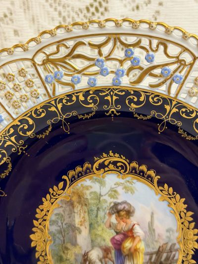 Meissen cobalt cabinet plate with an intricate reticulated border decorated with raised gold and blue forget-me-nots Meissen cobalt cabinet plate with an intricate reticulated border decorated with raised gold and blue forget-me-nots
