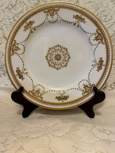 set of 11 Copeland Spode dessert plates which have a border of garlands of aqua enamel jewels and gold bows set of 11 Copeland Spode dessert plates which have a border of garlands of aqua enamel jewels and gold bows
