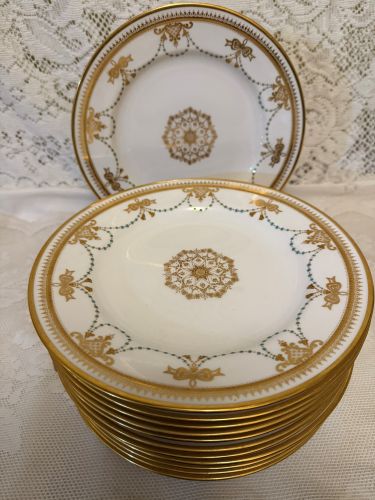 set of 11 Copeland Spode dessert plates which have a border of garlands of aqua enamel jewels and gold bows set of 11 Copeland Spode dessert plates which have a border of garlands of aqua enamel jewels and gold bows