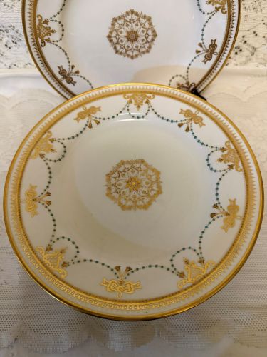 set of 11 Copeland Spode dessert plates which have a border of garlands of aqua enamel jewels and gold bows set of 11 Copeland Spode dessert plates which have a border of garlands of aqua enamel jewels and gold bows