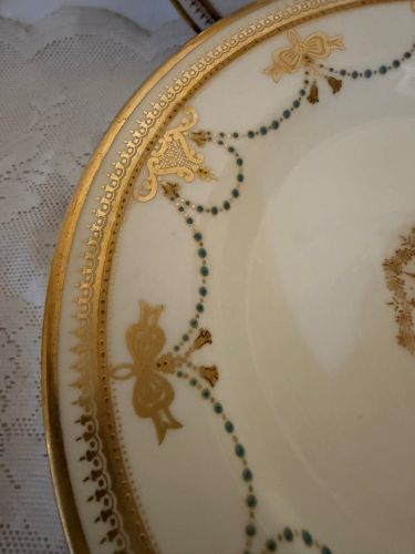 set of 11 Copeland Spode dessert plates which have a border of garlands of aqua enamel jewels and gold bows set of 11 Copeland Spode dessert plates which have a border of garlands of aqua enamel jewels and gold bows