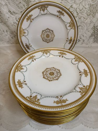 set of 11 Copeland Spode dessert plates which have a border of garlands of aqua enamel jewels and gold bows set of 11 Copeland Spode dessert plates which have a border of garlands of aqua enamel jewels and gold bows