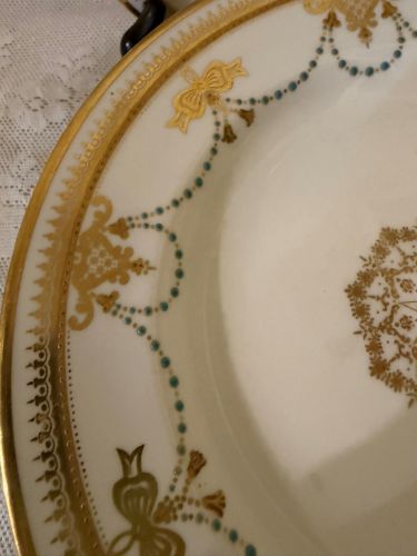 set of 11 Copeland Spode dessert plates which have a border of garlands of aqua enamel jewels and gold bows set of 11 Copeland Spode dessert plates which have a border of garlands of aqua enamel jewels and gold bows