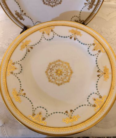 set of 11 Copeland Spode dessert plates which have a border of garlands of aqua enamel jewels and gold bows set of 11 Copeland Spode dessert plates which have a border of garlands of aqua enamel jewels and gold bows