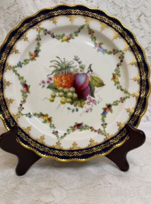 Set of 10 Royal Worcester plates each hand-painted with different fruits.