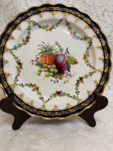 Set of 10 Royal Worcester plates each hand-painted with different fruits.