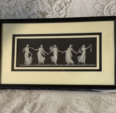 Wedgwood black and white jasperware plaque of the dancing hours. This plaque depicts beautiful ladies dancing in flowing dresses and scarves