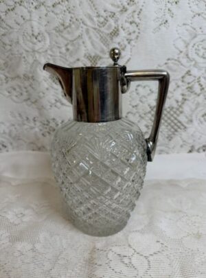 Brilliant Cut Glass Pitcher with a Silver Fitted Cover