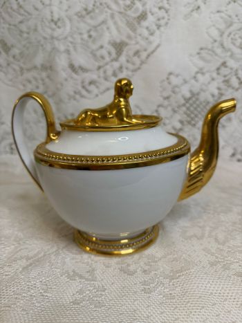 Rare white Paris Porcelain teapot that has a gold figural Sphinx on its cover